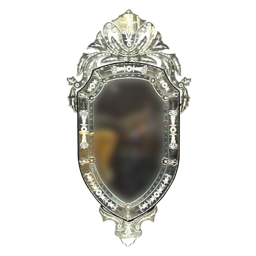 1093 - A 20th century shield shape Venetian glass mirror, 140cm high overall