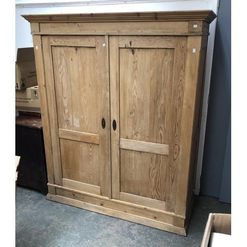 1081 - A 19th century stripped pine wardrobe, 151x63x179cmH