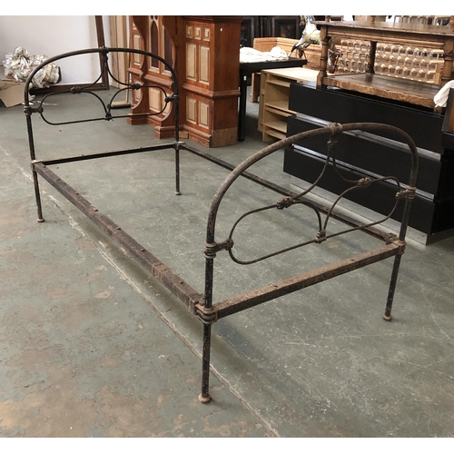 1086 - An iron single bed, the headboard 117cmH