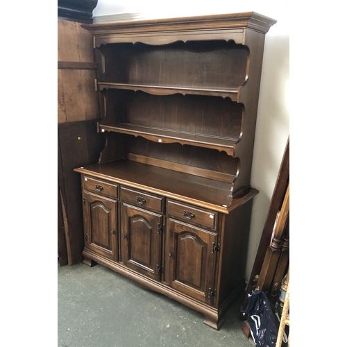 1087 - A stained kitchen dresser, 133x47x188cmH