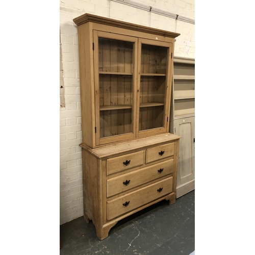 1073 - A glazed pine dresser, the top with two shelves over a base of two long over two short drawers, 111x... 