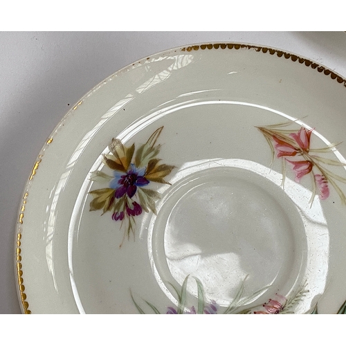 82 - A set of eight early 20th century hand painted porcelain coffee cups and saucers, floral spray desig... 