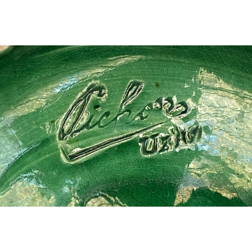 84 - A green glazed continental basket, 20cmD; together eight green glazed acorn leaf shaped pin dishes, ... 