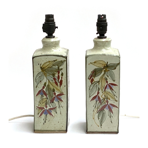 91 - A pair of Colin Kellam (b.1942), studio pottery table lamps, painted with fuchsia design, stamped, 2... 