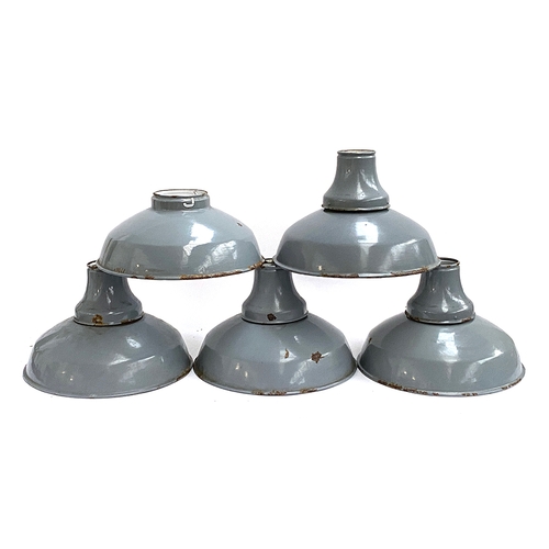 204 - A set of five early 20th century grey enamel industrial lightshades, one missing bayonet fitting col... 