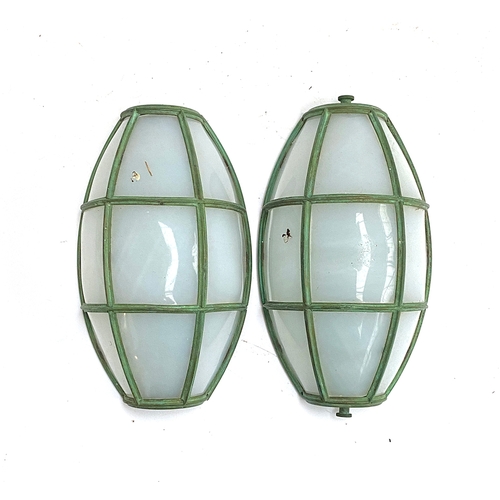 205 - A pair of perspex and verdigris effect wall lights by Charles Edwards, 27cmH; together with one othe... 