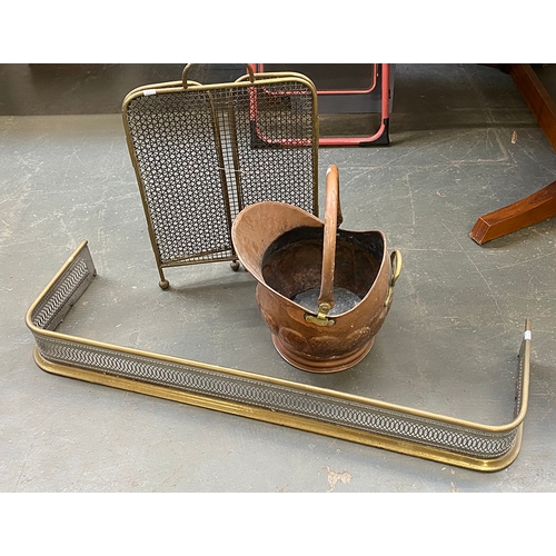 1035 - A pierced brass fender; coal scuttle and fire screen