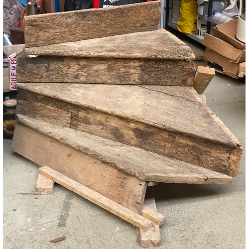 1066 - An 18th century elm staircase, ten steps, the base with a 45 degree curve, each tread 86cm wide