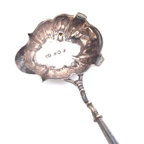 54 - A George II silver toddy ladle with twisted horn handle by David Hennell I, London 1744; together wi... 