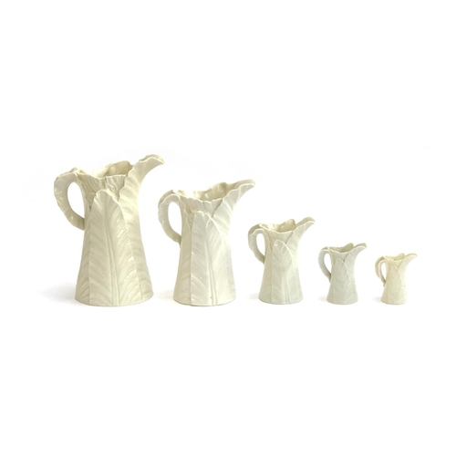 119 - A set of five graduating Royal Worcester banana leaf jugs