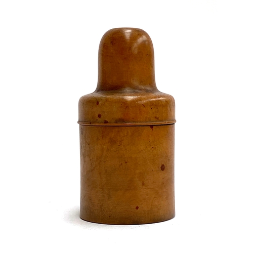 243 - A treen apothecary bottle holder with glass bottle and stopper, 13cmH