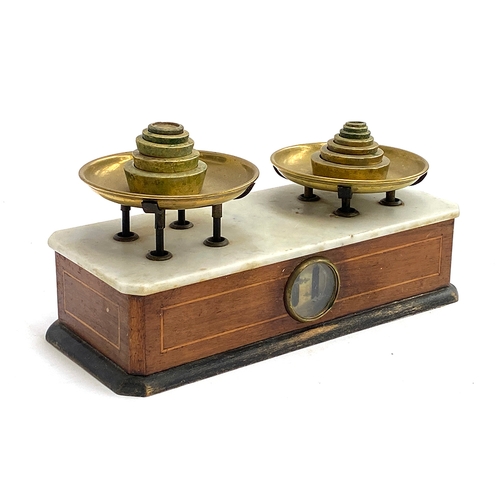 244 - A set of early 20th century marble topped and mahogany apothecary scales, with brass weights, 35.5cm... 