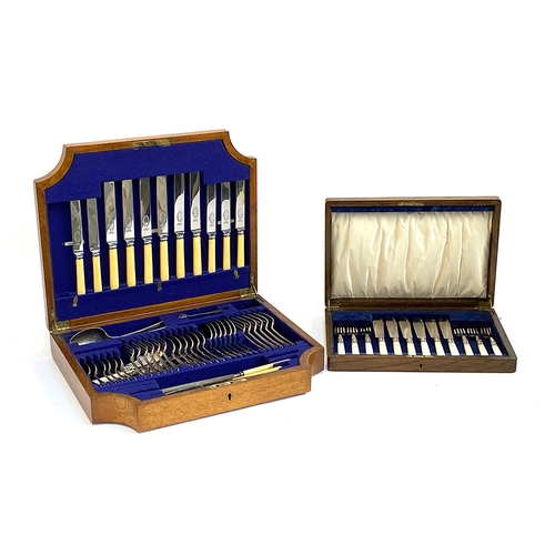 87 - An oak cased canteen of flatware for six place settings, the knives by Robert M. Slater; together wi... 