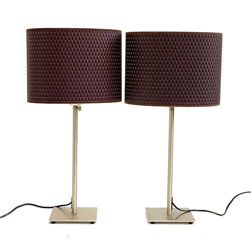 896 - A pair of brushed steel table lamps, with shades, 61cmH