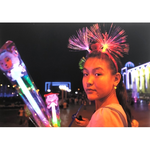 670 - Eric Lafforgue (b.1964), 'Kyrgyz Seller at the Fountain, 2009, Light Show, Bishkek, Kyrgyzstan', pho... 