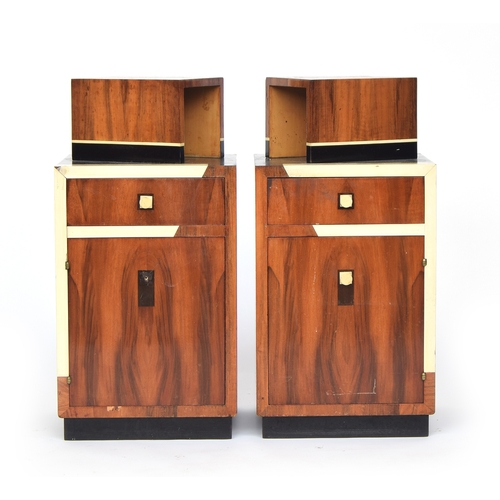 720 - A pair of French Art Deco maccasar ebony square bedside cabinets, each with an offset box niche supe... 