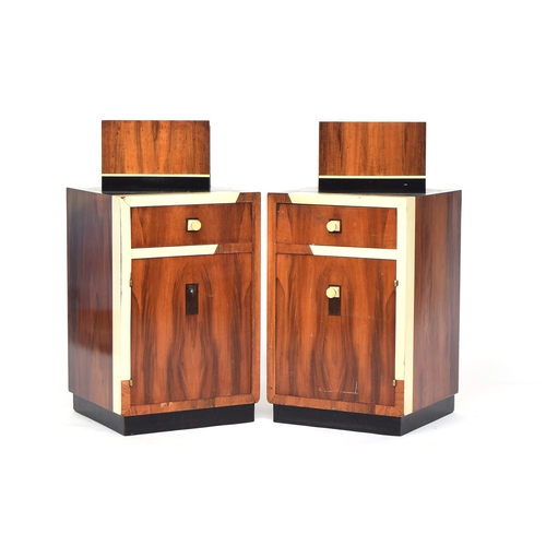 720 - A pair of French Art Deco maccasar ebony square bedside cabinets, each with an offset box niche supe... 