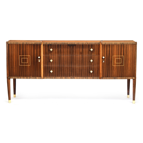 721 - A French Art Deco maccasar ebony reverse breakfront sideboard, the top in green shagreen, moulded ed... 