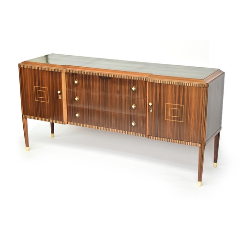 721 - A French Art Deco maccasar ebony reverse breakfront sideboard, the top in green shagreen, moulded ed... 