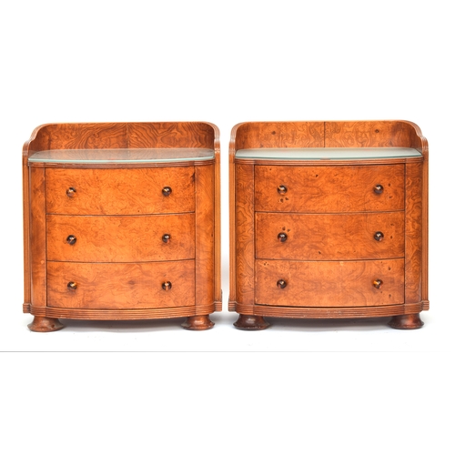 727 - A pair Austrian birch veneer bowfront bedside cabinets, c.1935, three quarter gallery back, over thr... 