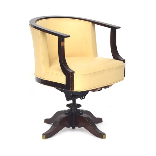 734 - A French Art Deco style swivel tub bergere desk chair, cream leather covers and stuffover seat, C sc... 