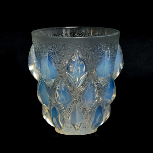A Rene Lalique opalescent glass 'Rampillon' vase, tapered form with lozenge nodes on a foliate ground, stencilled mark to base, 12cm high