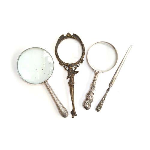 351 - A bronze Art Nouveau style magnifying glass, the handle in the form of a semi clad lady, 20.5cm long... 