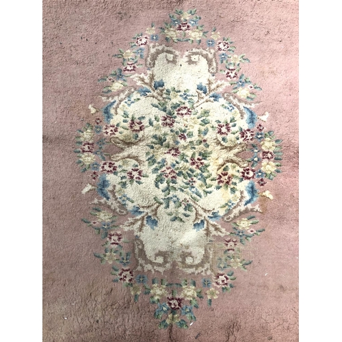 867 - A large wool rug, 390x308cm