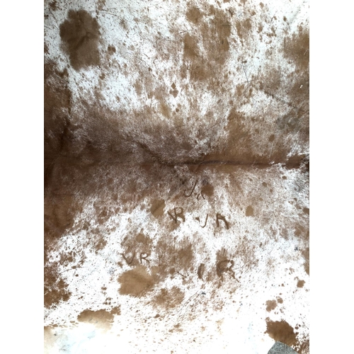 864 - A brown cowhide rug, approx 127x226cm