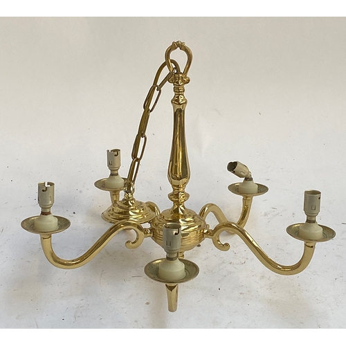 884 - A pair of five arm gilt metal chandeliers, approx. 55cmW; together with one smaller five arm chandel... 