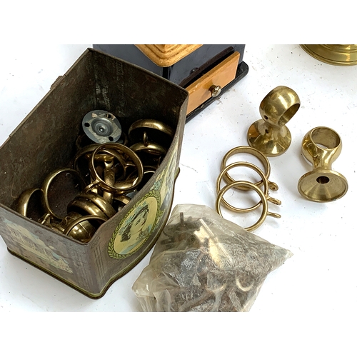 279 - A mixed lot to include: vintage style coffee grinder, brass coffee pot and sugar bowl, brass curtain... 