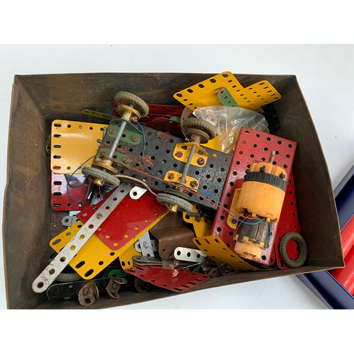 284 - A box of Meccano, including wheels, pulleys and motor, together with a box containing over 100 child... 