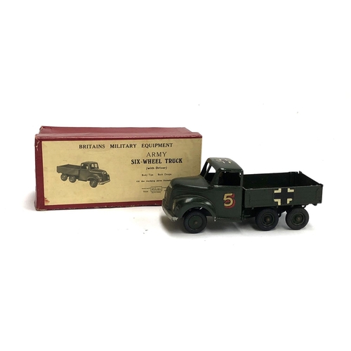 354 - A Britains military equipment Army six wheel truck with driver, no. 1335, boxed