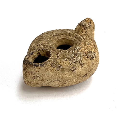 317 - Archeological interest: A Roman style oil lamp, 9cmL