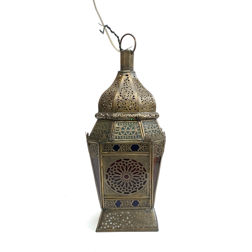 328 - An eastern pierced metal and coloured glass lantern, fitted for electricity, 52cmH