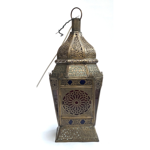 328 - An eastern pierced metal and coloured glass lantern, fitted for electricity, 52cmH