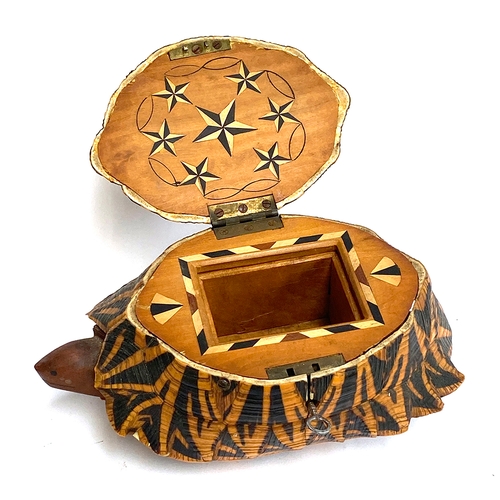 532 - An early 20th century Indian star tortoise tea caddy, marquetry inlaid interior, 25cmL