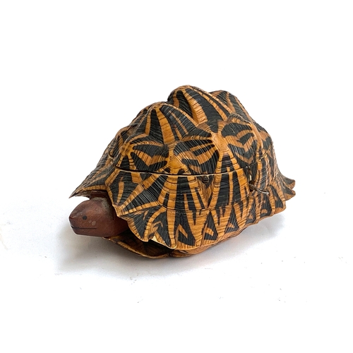 532 - An early 20th century Indian star tortoise tea caddy, marquetry inlaid interior, 25cmL