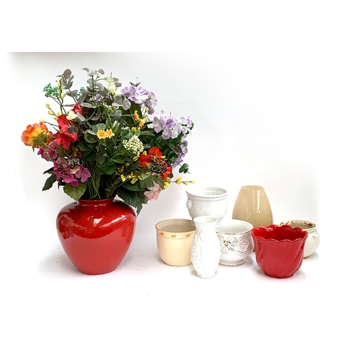 347 - A quantity of faux flowers; together with various planters and vases