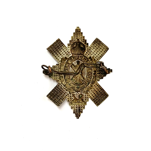 365 - Scottish military interest: A Black Watch Royal Highlanders cap badge, bearing motto 'Nemo Me Impune... 