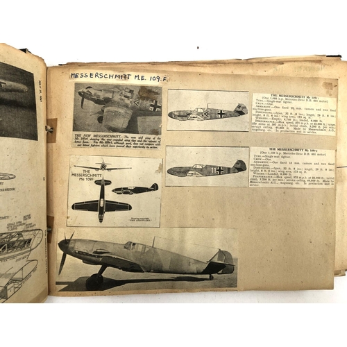 231 - An album relating to WWII aircraft containing a quantity of photos, newspaper clippings, cigarette c... 