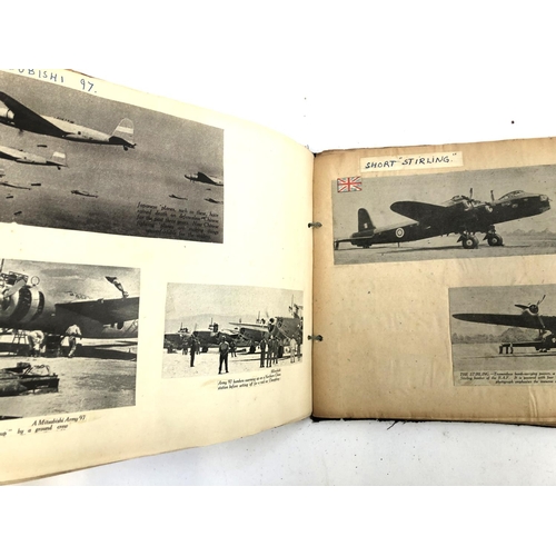 231 - An album relating to WWII aircraft containing a quantity of photos, newspaper clippings, cigarette c... 