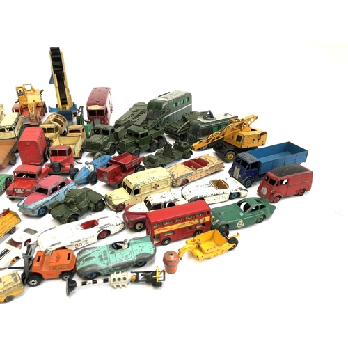 290 - A large quantity of play worn die cast model vehicles, mainly Dinky, to include TV mobile control ro... 