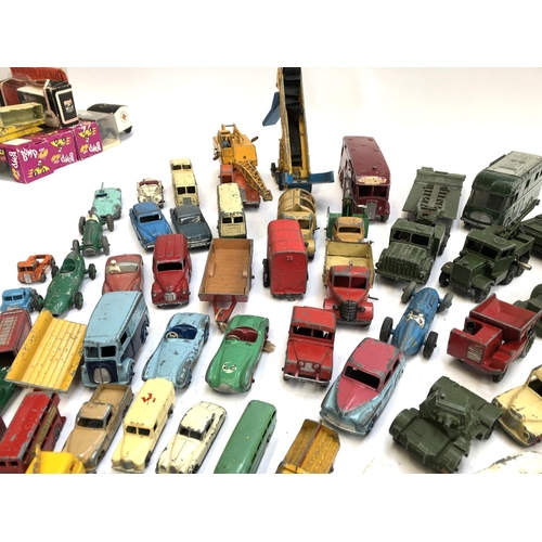 290 - A large quantity of play worn die cast model vehicles, mainly Dinky, to include TV mobile control ro... 