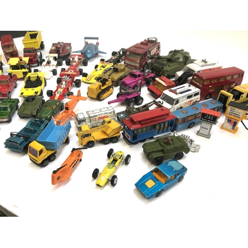 291 - A quantity of play worn die cast model vehicles to include Dinky Thunderbird 2, Police Ford transit ... 