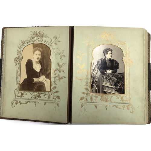 371 - Two Victorian leather photo albums containing a quantity of photographs (one spine af)