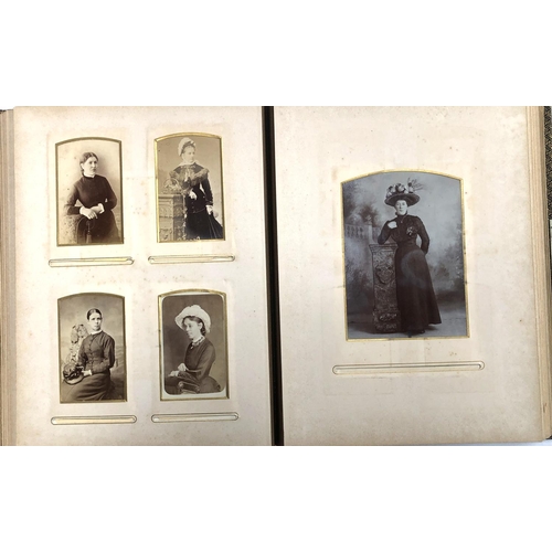 371 - Two Victorian leather photo albums containing a quantity of photographs (one spine af)