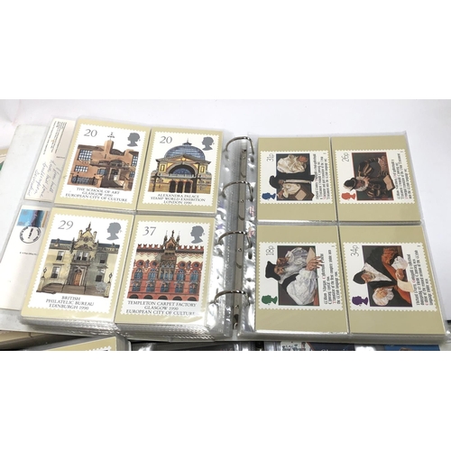 372 - A large quantity of PHQ cards in three albums, together with an album of phonecards