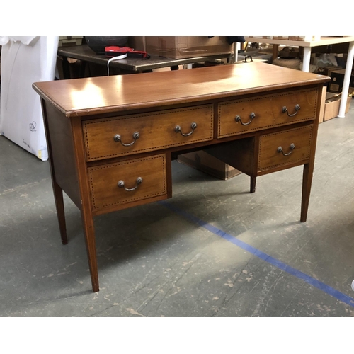 1152 - An early 20th century mahogany dressing table, with four drawers surrounding a kneehole, 122x52x76cm... 