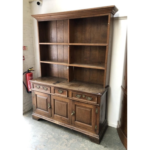 1153 - An oak dresser, the base with three drawers over panelled cupboards, 148x50x209cmH